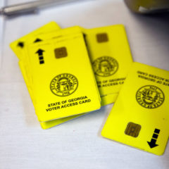 Georgia says switching back to all-paper voting is logistically impossible