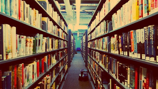 books in a library, stacks books in a library, stacks