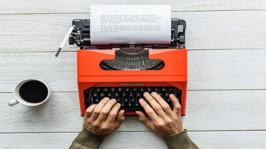 Typewriter with hands Typewriter with hands