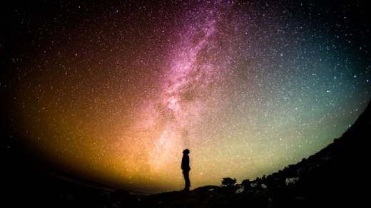 Person looking up at the stars Person looking up at the stars