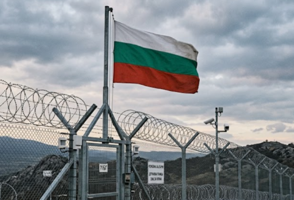 Bulgaria flag above fence